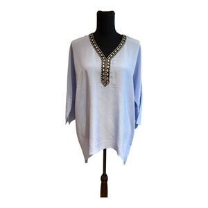 Zozo NWT top with a beaded embellishment around the v-neckline.